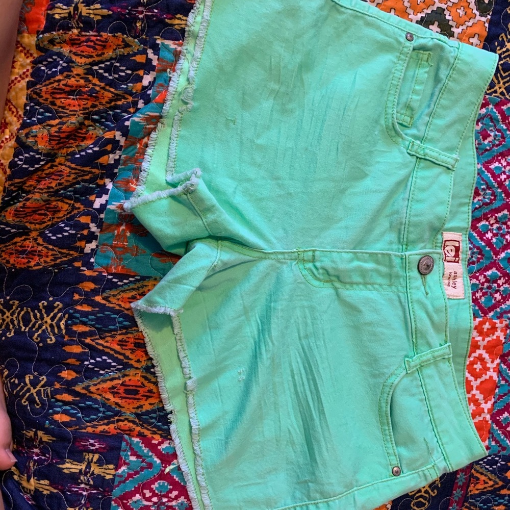 Neon green jean shorts